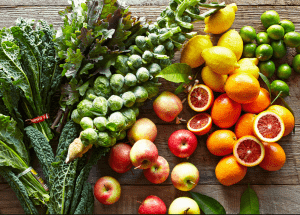 a group of fruits and vegetables on a wood surface Healthy Weight Loss Diets Westwood
